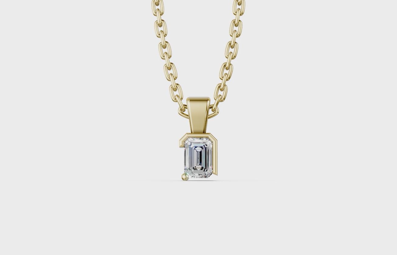 Touche's Semis Emerald Pendant